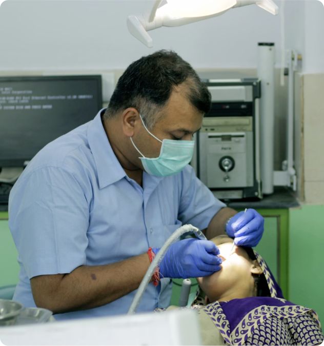 Dr Kaushik treating patient